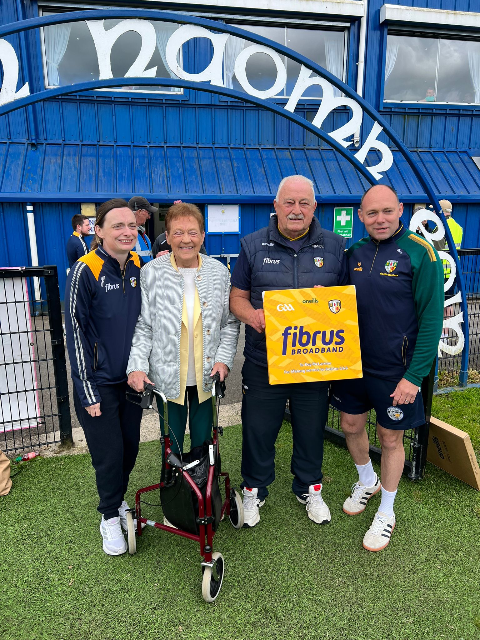 Roy McLarnon with club representatives marking 50 years of service to Antrim GAA
